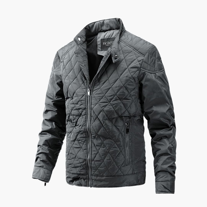 Giacca da uomo trapuntata, collo alto per protezione e stile. Un capo elegante e moderno per la moda uomo.