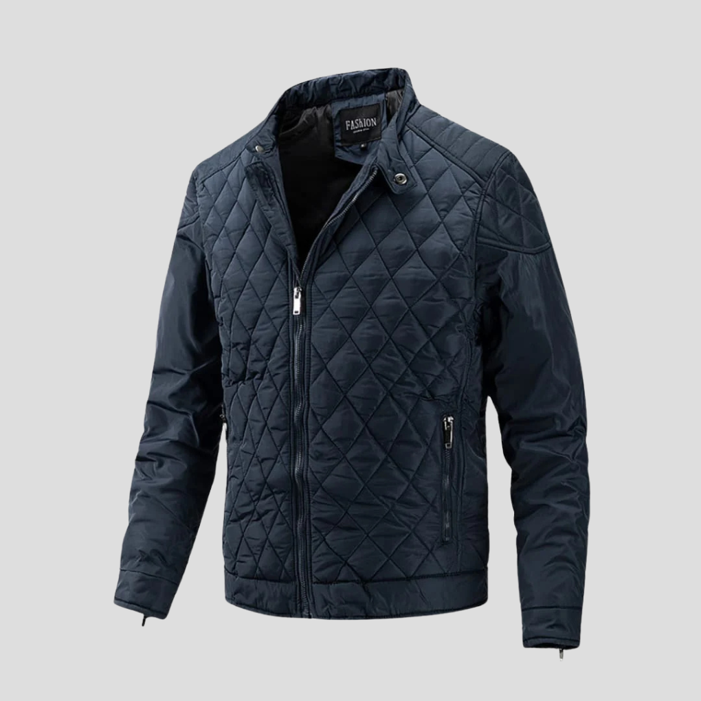 Giacca uomo leggera trapuntata con cuciture diamante, collo rialzato. Comfort e stile per autunno.