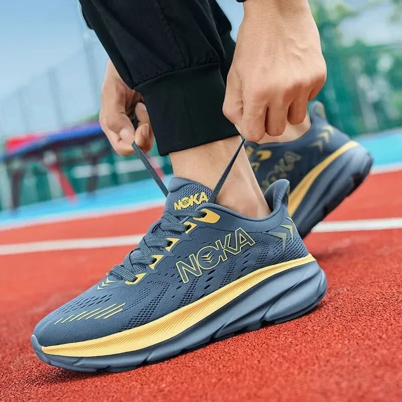 Scarpe da ginnastica uomo leggere con suola ammortizzata, ideali per la corsa su strada e comfort quotidiano.