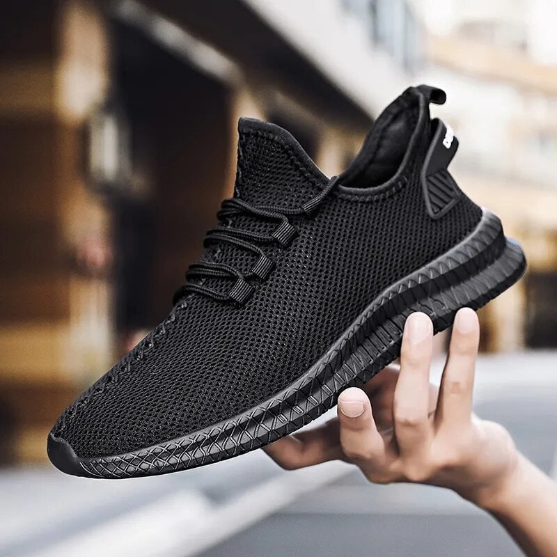 Scarpe da corsa uomo traspiranti con lacci, leggere e comode per sport e tempo libero.