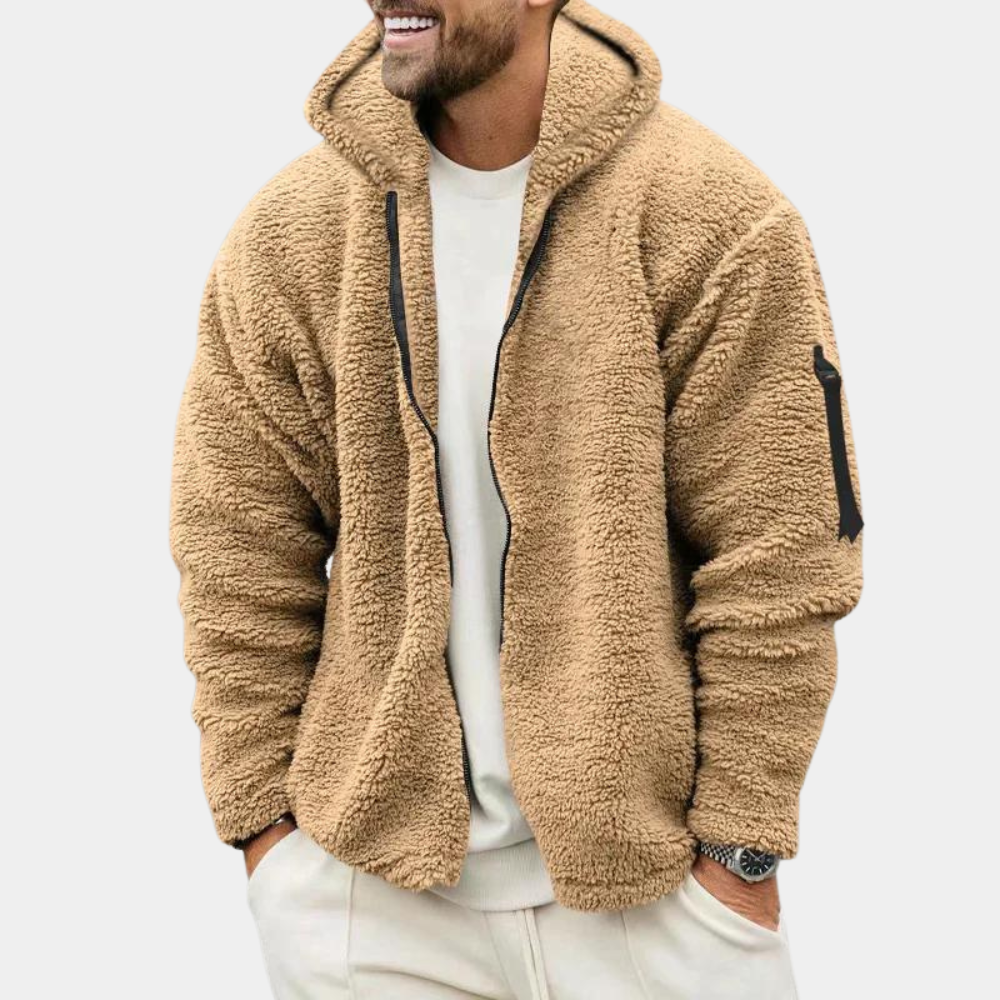 Giacca Sherpa uomo con cappuccio, calda e casual, ideale per l'inverno. Chiusura full zip e tasche laterali.
