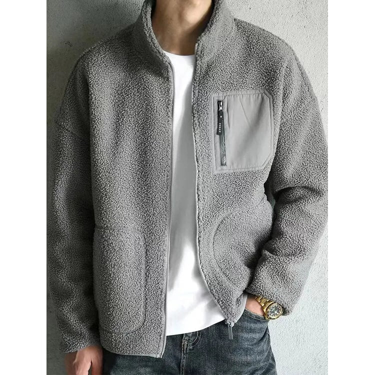 Giacca uomo in sherpa con tasca funzionale e zip, design casual, morbida e calda per l'autunno/inverno.