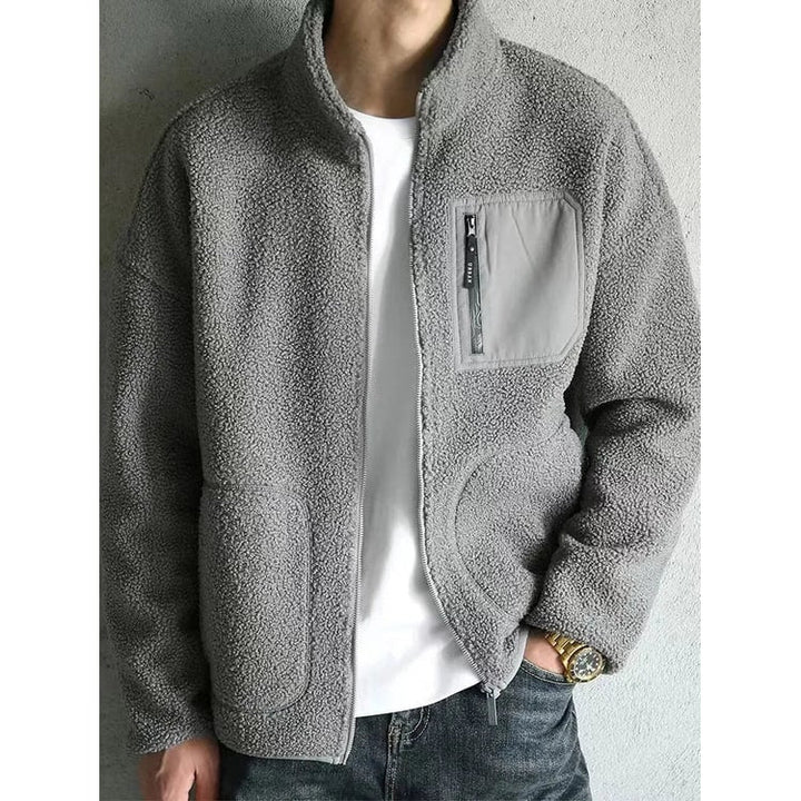 Giacca uomo in sherpa con tasca funzionale e zip, design casual, morbida e calda per l'autunno/inverno.
