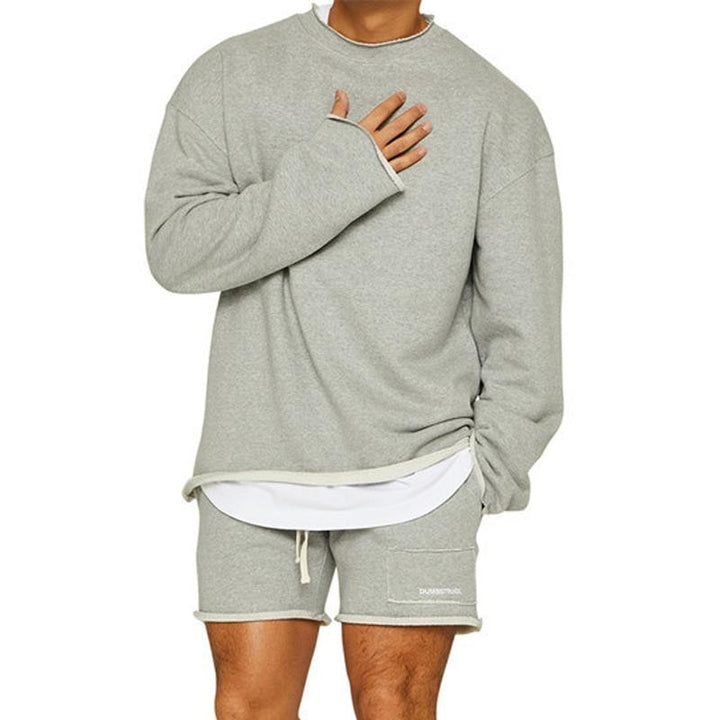 Set lounge oversize uomo, perfetto per il relax in casa e un look casual da tempo libero.