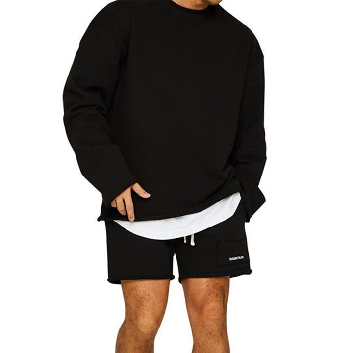 Dettaglio del tessuto comfortevole del completo lounge uomo oversize, ideale per il tempo libero.