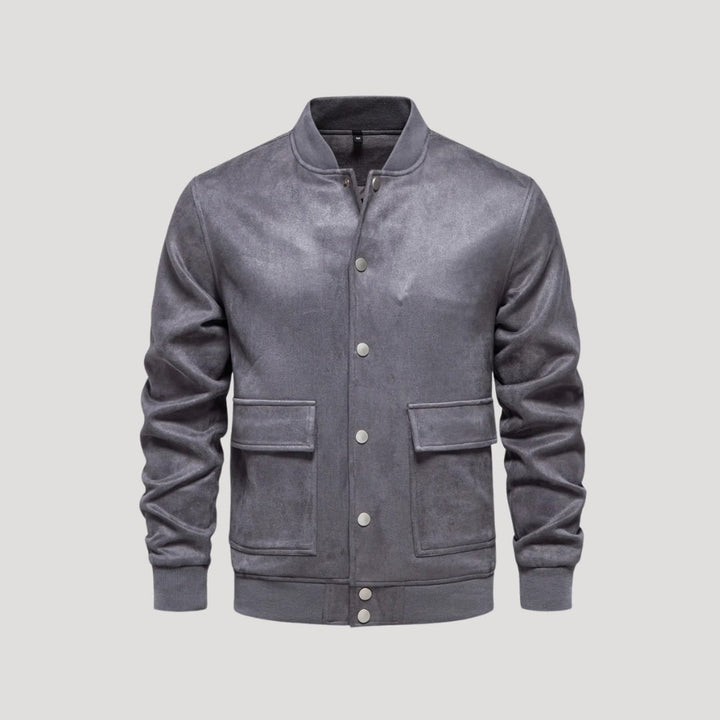 Elegante bomber uomo con bottoni a pressione. Giacca versatile e iconica per ogni guardaroba maschile casual.