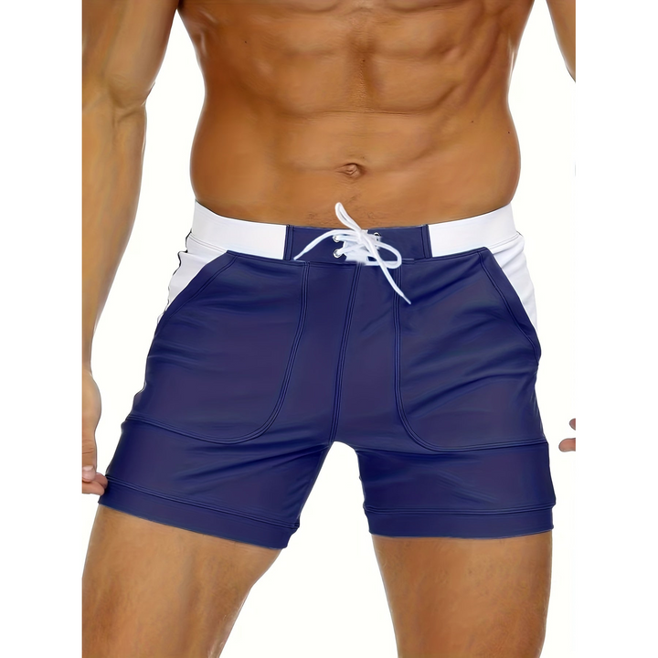 Boxer mare uomo comfort con vita elastica e tasche, ideali per nuoto, relax in spiaggia o in piscina.