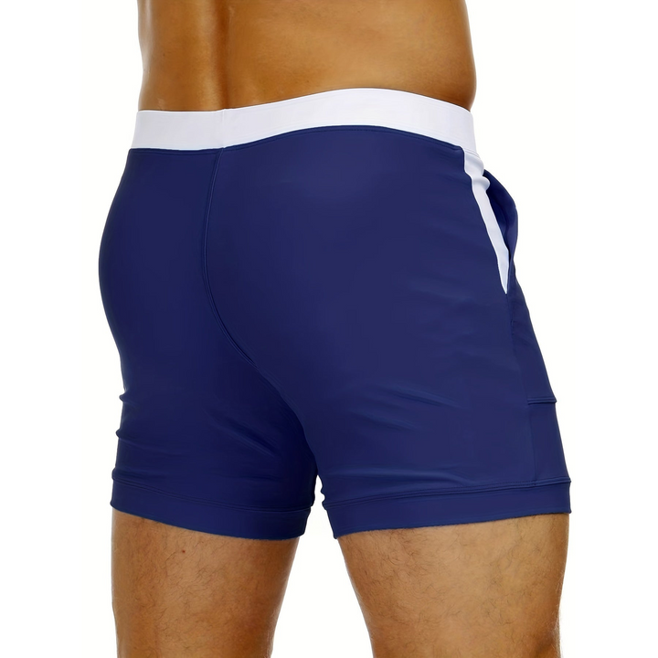 Pantaloncini nuoto uomo moda mare, asciugatura rapida e pratiche tasche per un'estate confortevole.