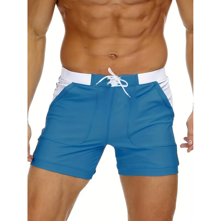 Elegante boxer mare uomo con tasche, vita elastica e asciugatura rapida per il massimo comfort estivo.