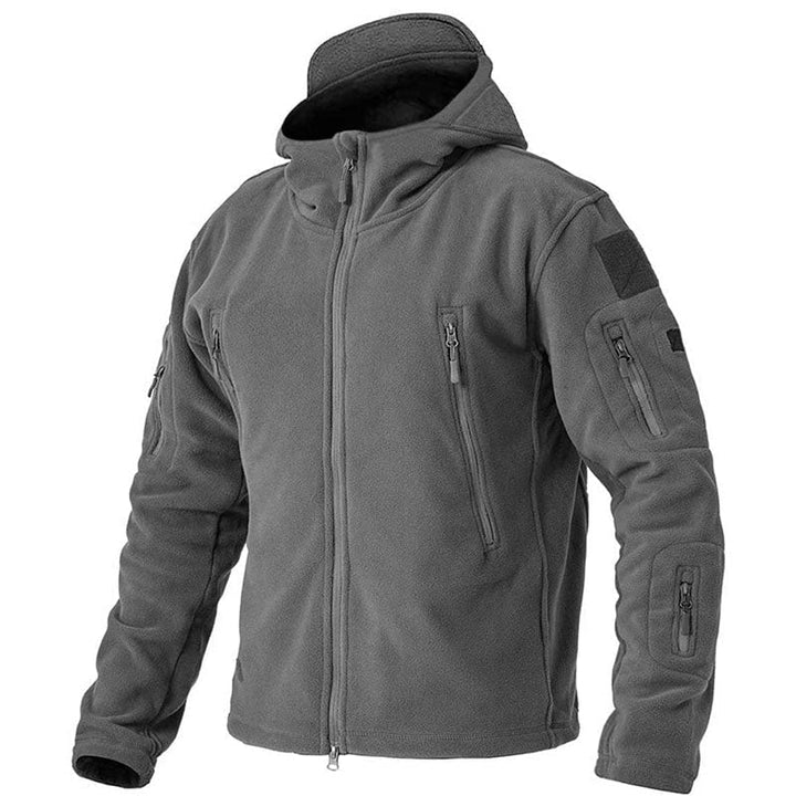 Giacca uomo tattica con cappuccio, antivento, tasche sicure, ideale per trekking, campeggio e outdoor.