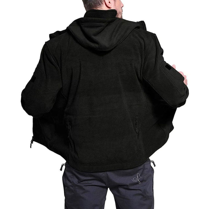 Robusta giacca tattica uomo con cappuccio, antivento, cerniera intera, tasche per avventure outdoor.