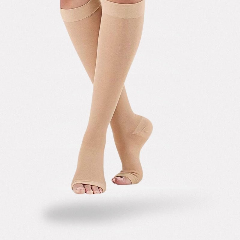 Calze a compressione uomo senza punta per vene varicose, migliorano circolazione e supporto gambe.