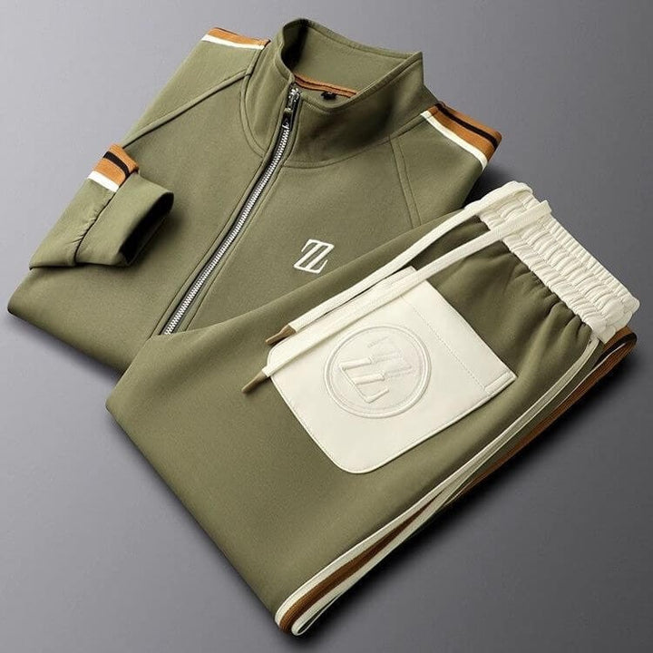 Tuta sportiva uomo moderna, completo con giacca a zip e pantaloni, perfetta per moda uomo e comfort. Casual.