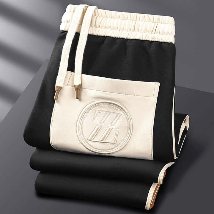 Versatile tuta uomo per casual e sport, completo con giacca zip e pantaloni, massimo comfort. Abbigliamento.