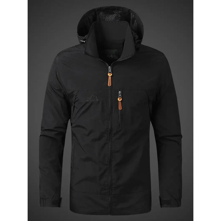 Giacca a vento uomo casual e sportiva, impermeabile, ultraleggera e ripiegabile, perfetta per attività outdoor.