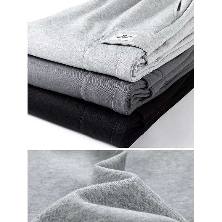 Pantaloni cargo sportivi uomo, vestibilità larga con vita elastica e tasche pratiche, ideali per streetwear moderno.