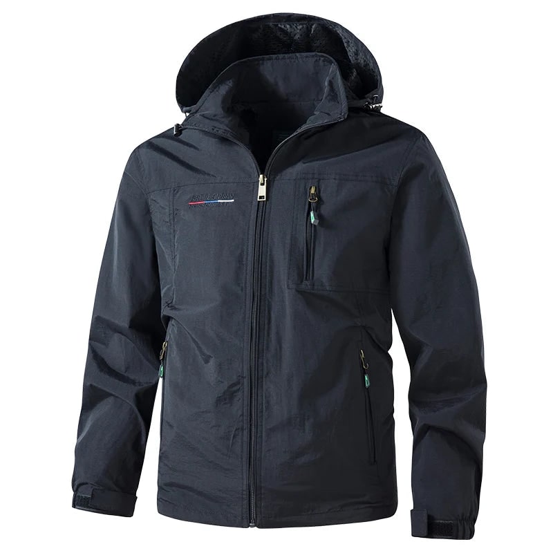 Giacca a vento uomo leggera e alla moda, con cappuccio e tasche con cerniera. Perfetta per primavera e autunno.