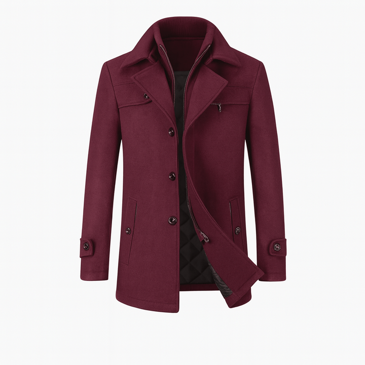 Trench uomo grigio scuro, ideale per eventi formali o casual chic. Confort e stile in un unico capo.