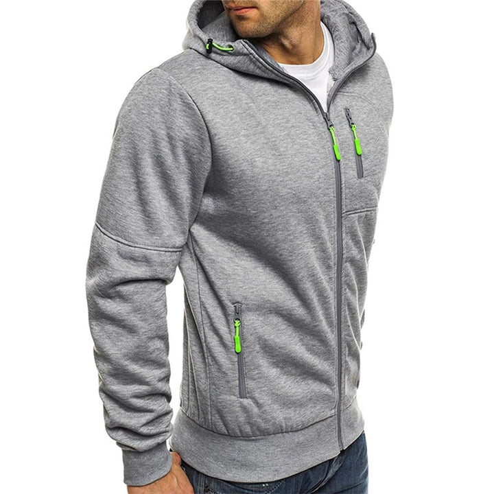 Felpa con cappuccio da uomo, cerniera e tasche zip. Look sportivo ed elegante per il comfort di ogni giorno.