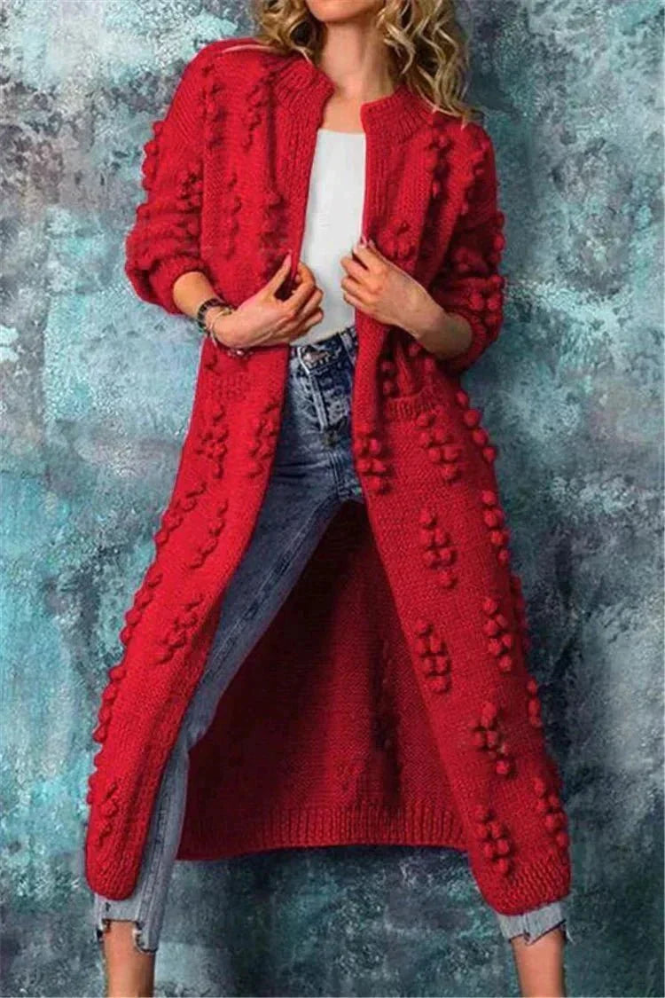 Cardigan lungo da donna elegante e morbido, vestibilità comoda, perfetto per un look raffinato.