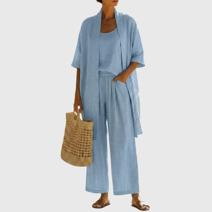 Set 3 pezzi donna in lino: pantaloni palazzo fluidi, top e cardigan leggero, look estivo raffinato e confortevole.