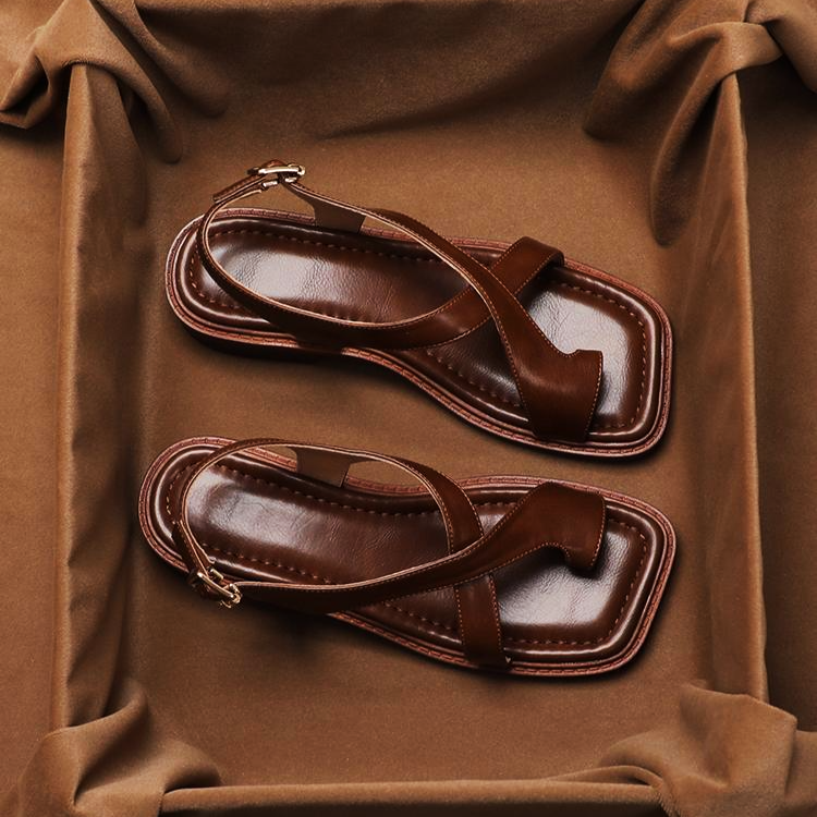 Sandali eleganti donna crossover con fibbia per un look estivo e confortevole.