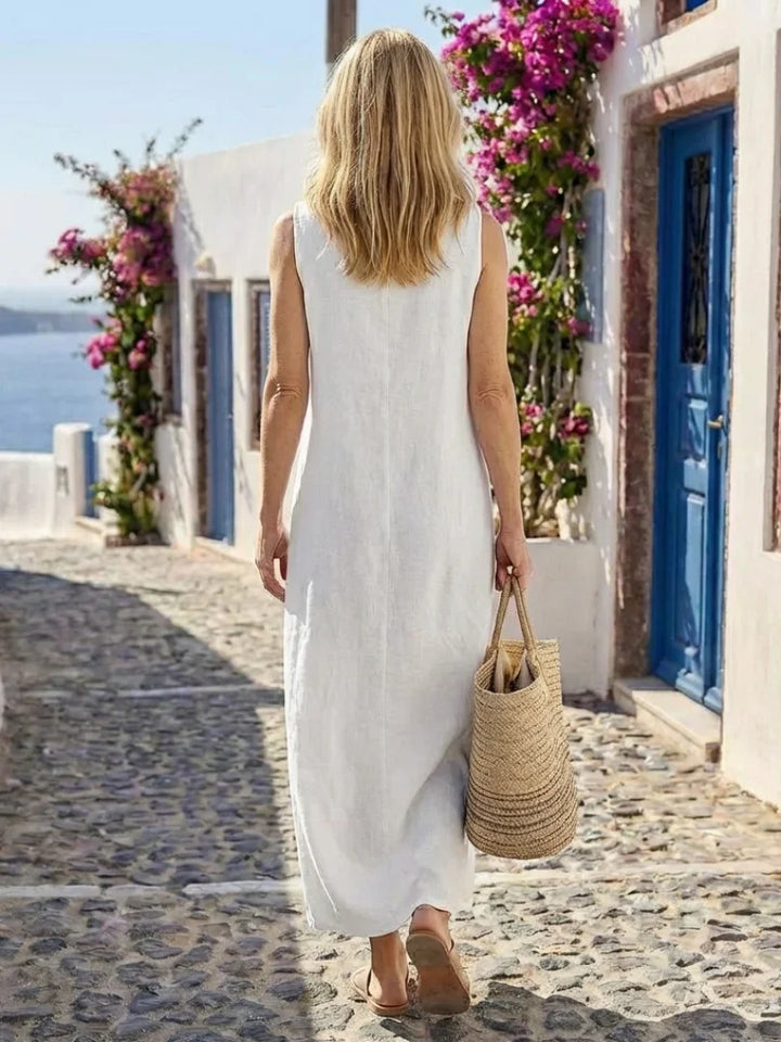 Abito maxi donna rosa, senza maniche, scollo rotondo. Vestito estivo elegante e casual per moda donna.