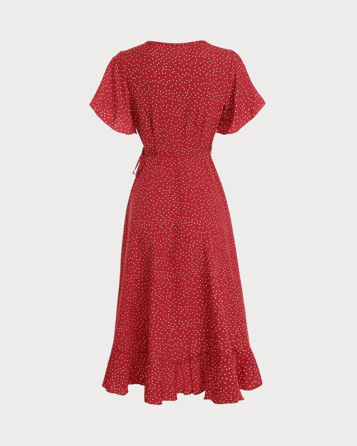 Elegante abito midi estivo da donna a portafoglio con pois rossi. Vestito versatile, perfetto per il giorno e la sera.