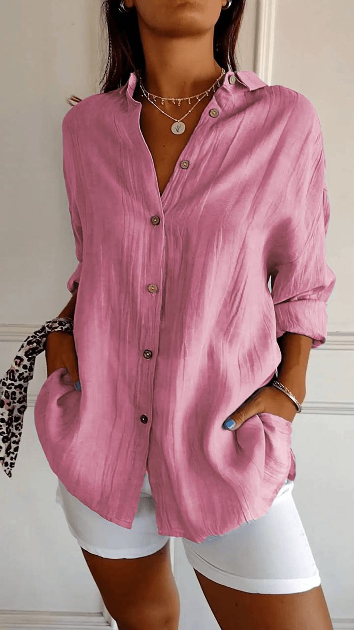 Morbida camicia elegante donna a maniche lunghe, stile slim fit per outfit versatili e moderni.