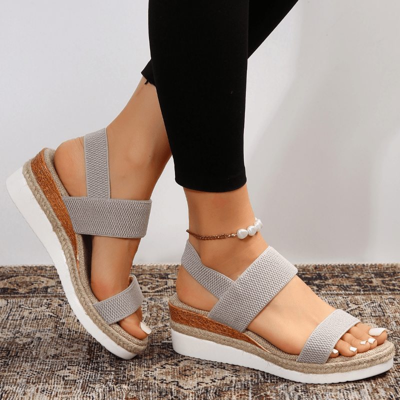 Sandali donna con zeppa, cinturino elastico. Perfetti per stile casual o elegante, comfort estivo garantito.