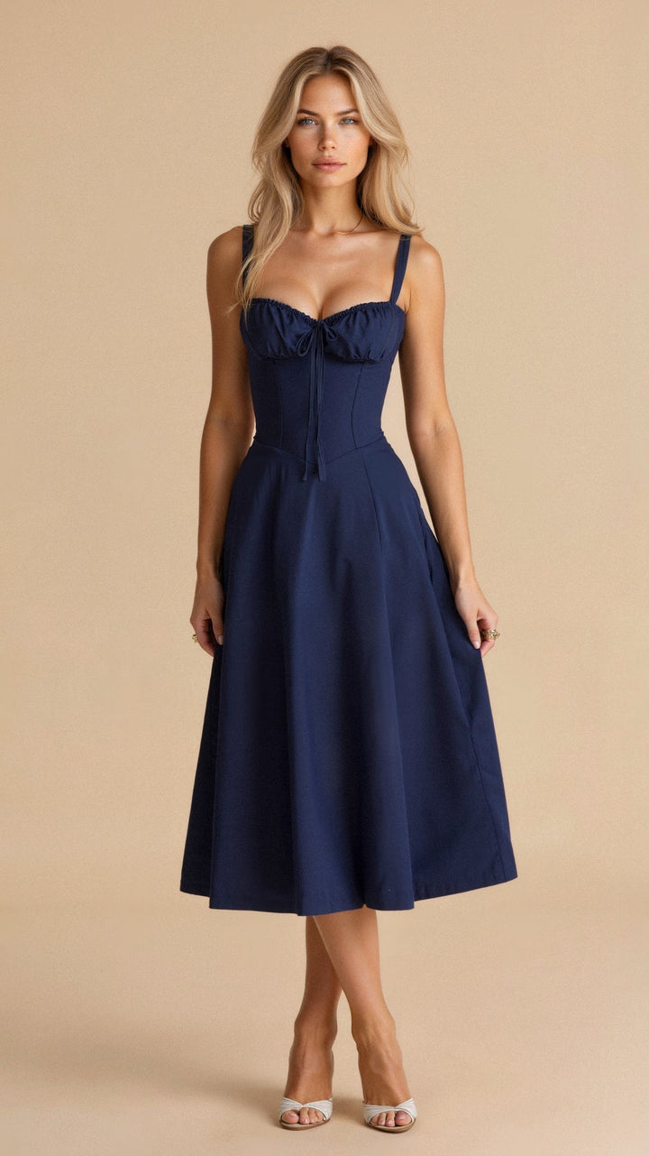 Eleganza estiva: abito midi donna con corpetto corsetto e gonna fluida. Vestito versatile per il giorno o la sera.