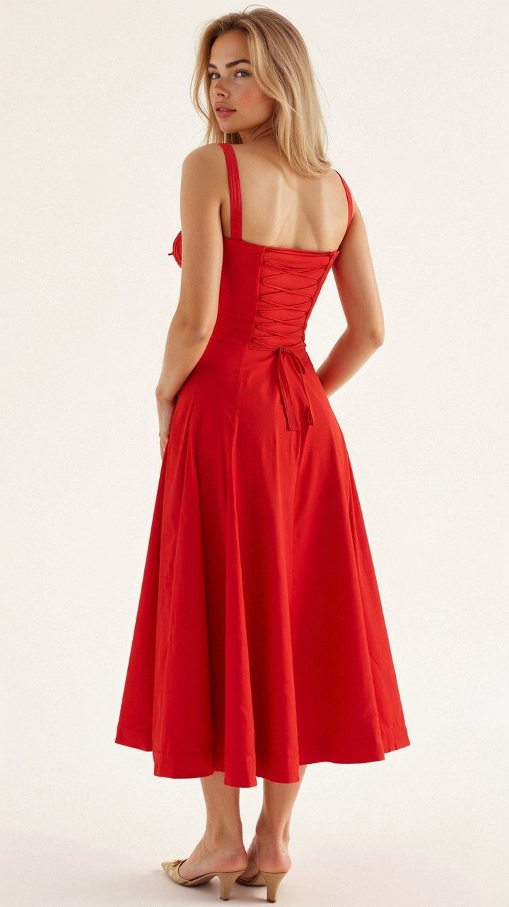 Vista posteriore abito midi elegante donna, gonna fluida svolazzante. Vestito perfetto per l'estate.