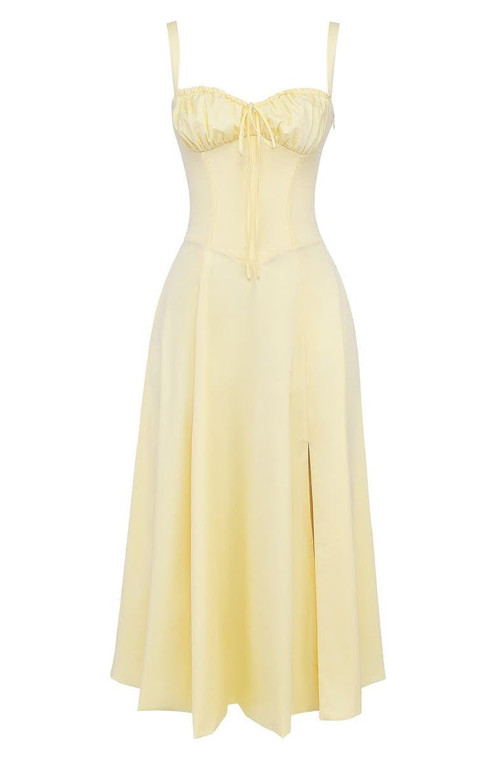 Abito midi donna con corpetto a corsetto, mostra eleganza e fluidità. Ideale per la moda estiva.