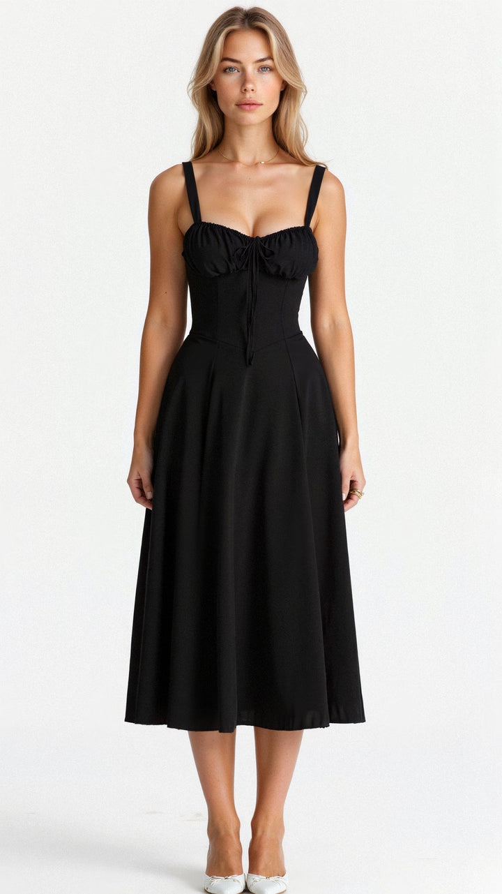 Vestito midi estivo da donna con corpetto a corsetto e gonna fluida. Perfetto per un look casual chic.