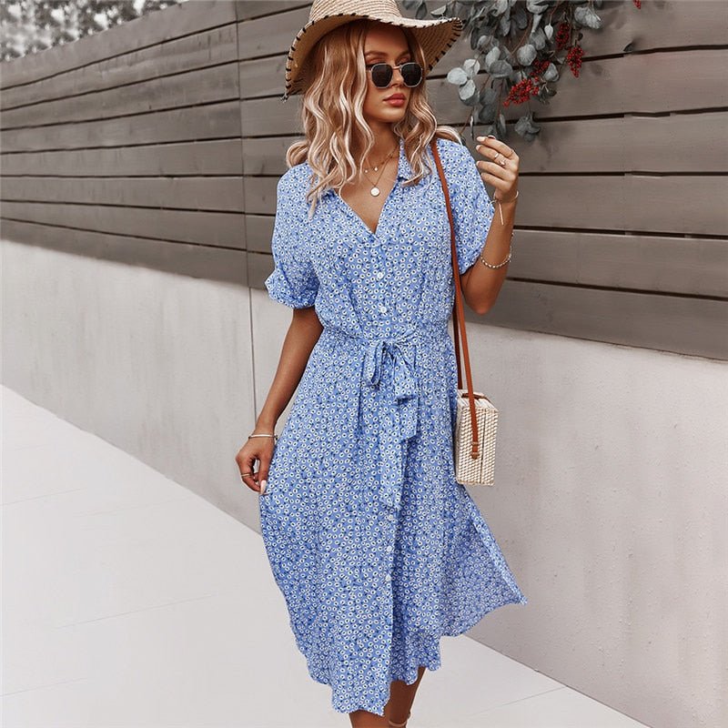 Abito estivo donna midi floreale con laccetti e bottoni. Perfetto per look casual-eleganti.