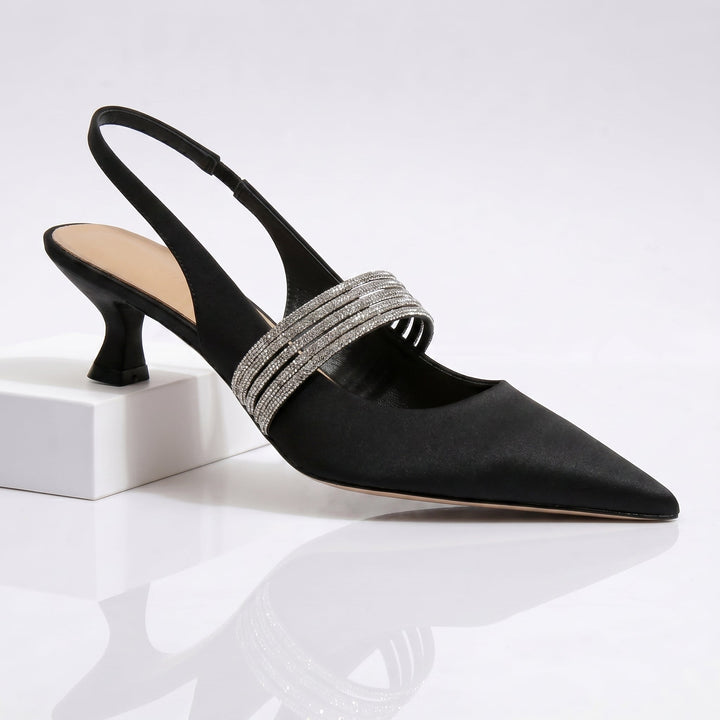 Scarpe décolleté slingback donna con tacco basso comodo, ideali per eventi eleganti e look alla moda.