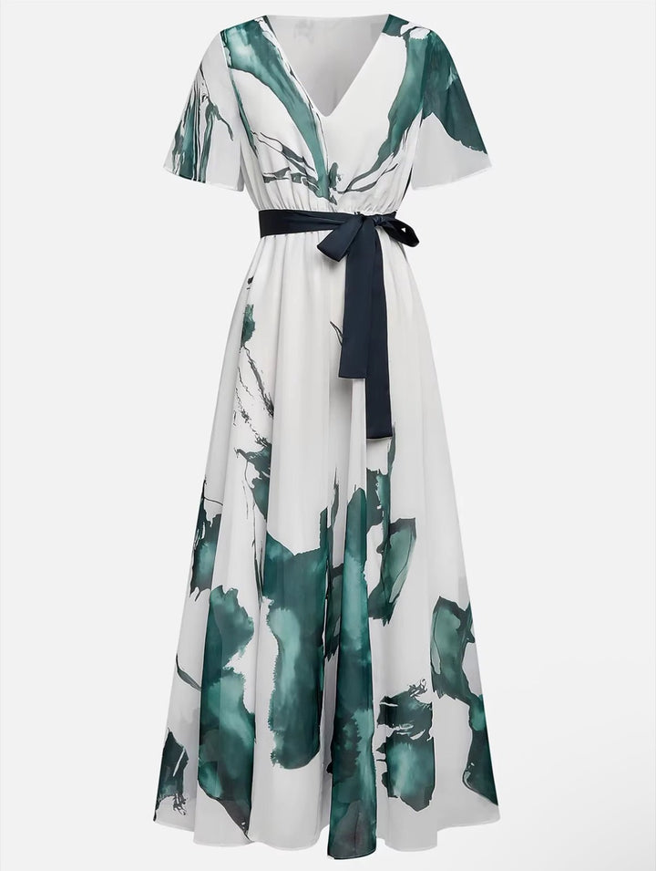 Abito lungo donna elegante, stampa acquerello fluida e multicolore. Perfetto vestito estivo versatile chic.
