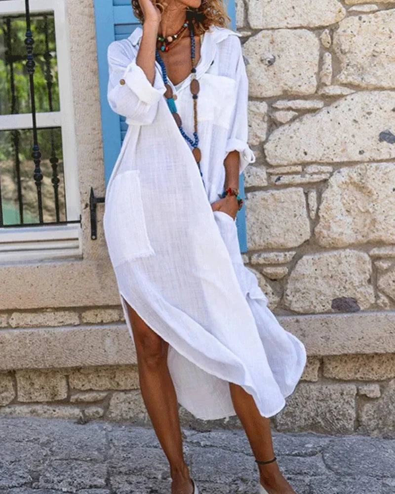 Elegante abito chemisier maxi donna asimmetrico, con colletto classico, un must per la moda estiva.