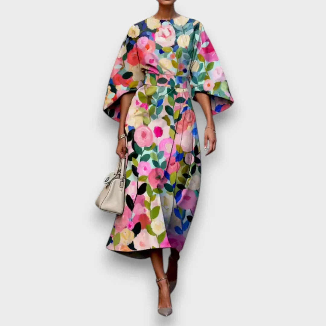 Abito midi floreale da donna per cerimonie, con maniche ampie. Perfetto per un look elegante estivo da invitata.