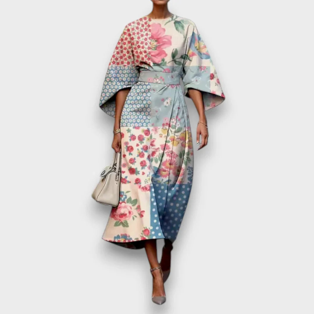 Vestito estivo floreale midi da donna, fluido e versatile, con maniche ampie. Ideale per cerimonie e invitata.