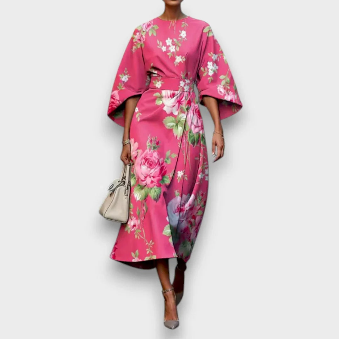 Abito da donna midi con stampa floreale, maniche ampie e design elegante. Perfetto per cerimonie e feste estive.