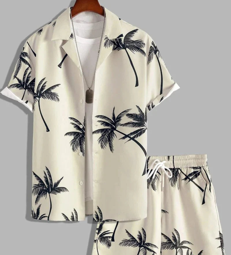 Camicia uomo estiva con stampa palma tropicale, parte di un completo coordinato casual per le vacanze e il mare.