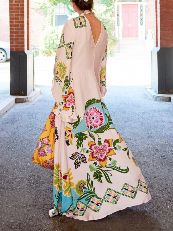 Abbigliamento femminile: abito maxi floreale scollo alto, manica lunga, vestito elegante per ogni occasione.