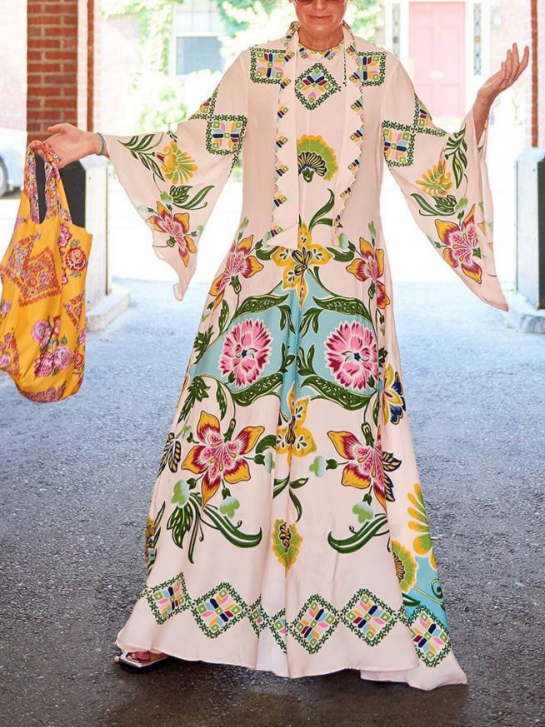 Abito da cerimonia donna, design floreale, maxi lunghezza, manica lunga e scollo alto. Eleganza senza tempo.