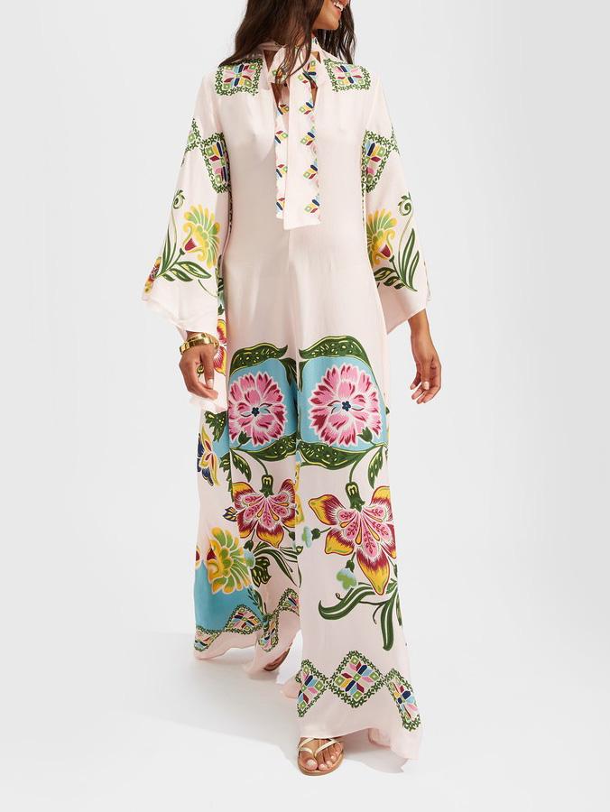 Moda donna: abito maxi casual-elegante floreale con manica lunga e scollo alto, per un comfort chic.