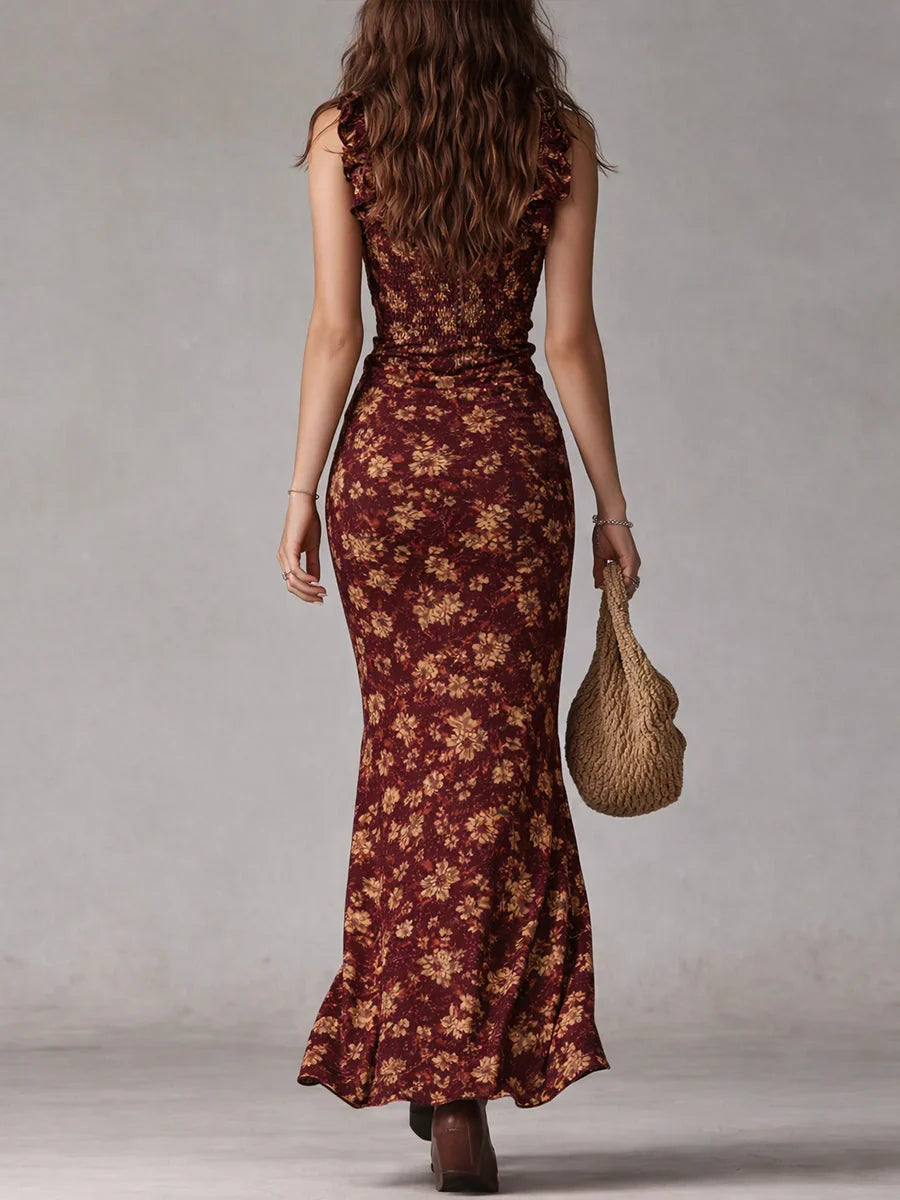 Abito da cerimonia rosso ciliegia con stampa floreale e spacco laterale. Maxi vestito elegante per invitata.