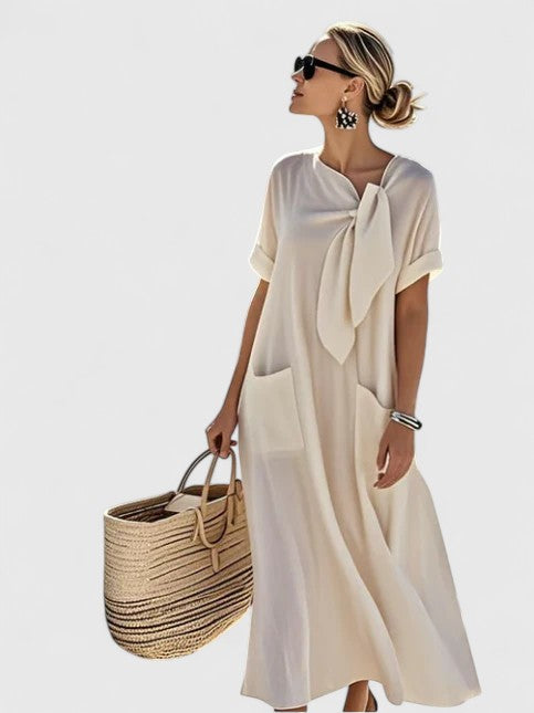 Vestito midi donna fluido e versatile, ideale per outfit casual chic o serali estivi.