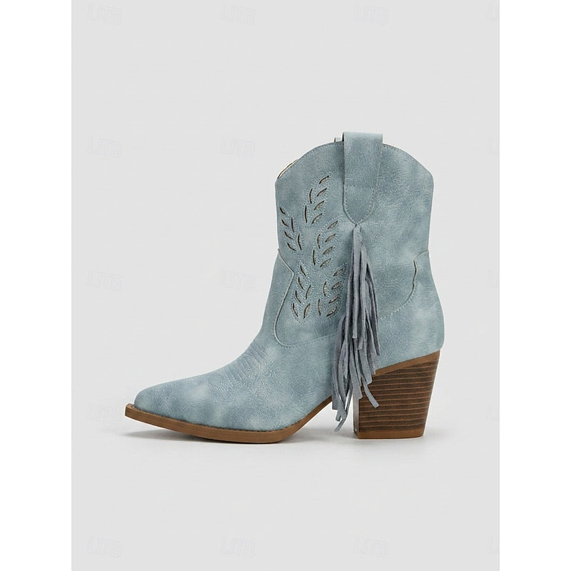 Stivaletti western donna con nappe, punta affusolata e tacco largo. Calzature sintetiche versatili.