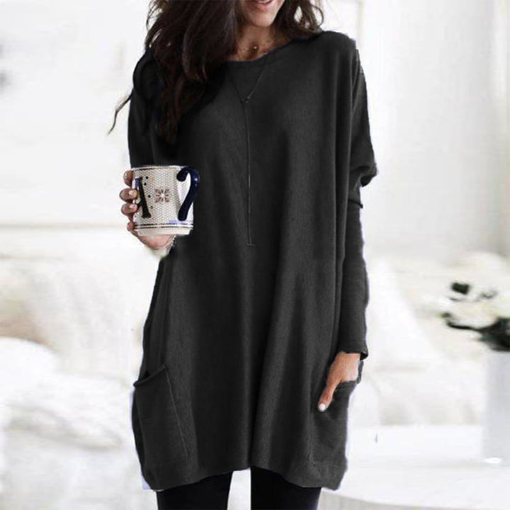 Morbido abito donna oversize in maglia, maniche lunghe e scollo tondo. Comodità e stile autunnale.