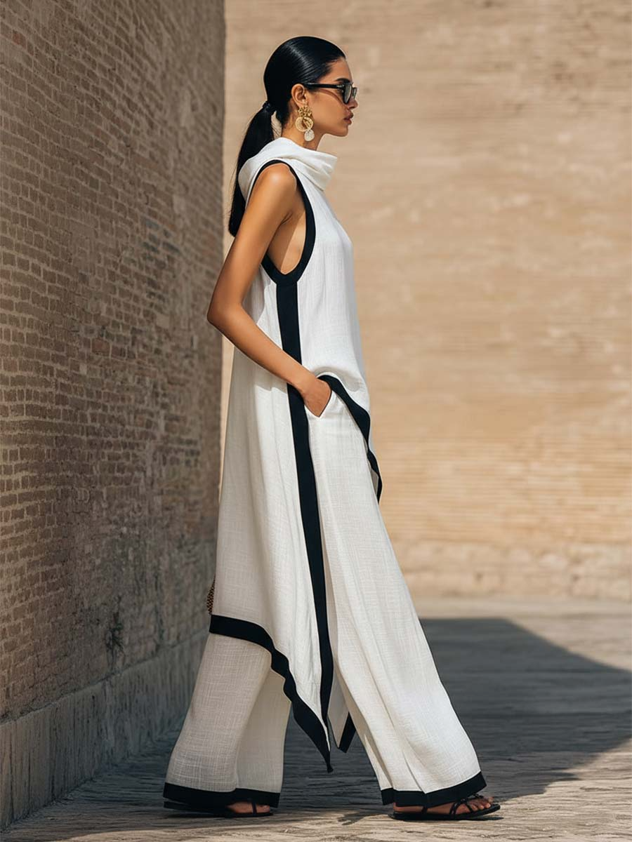 Moda donna: completo elegante in lino e cotone con dettagli artistici unici, perfetto per ogni occasione.